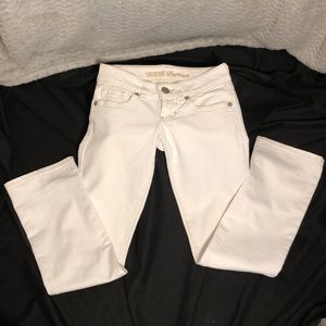 White Guess stretch, straight leg jeans.